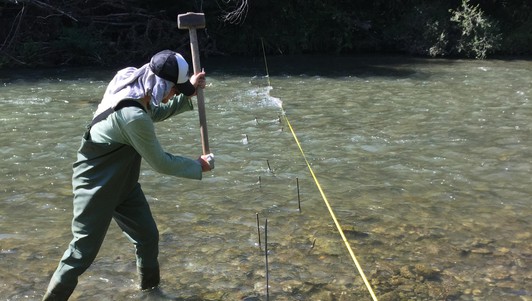 Severin Stähly working in the Sarine river. © LCH/EPFL