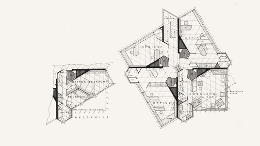 Duplex apartment: in the centre, a concrete trunk, extended by walls in the shape of a mill wing.©DR